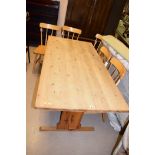 A modern pine refectory style dining table;