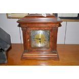 A modern Georgian style bracket clock by Howard & Millar with train movements, 47cms high.