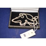 A two-strand graduated cultured pearl necklace, with white metal clasp stamped 'Silver 77'.