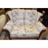 A modern two-seater wing back settee,