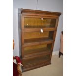 A four section Globe Wernicke style stacking bookcase, 87cms wide.