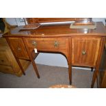 An Edwardian satinwood banded bowfront sideboard in the Georgian style, 153cms wide.