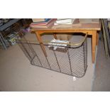 A 19th Century brass and wirework fireguard, 33cms wide.