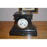 A French black plate and green malachite inlaid mantel clock by M Johnson Paris,