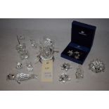 Swarovski clear crystal ornaments, to include: an owl; a mouse; a squirrel; an angel; and others,