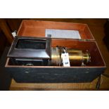 A lantern slide projector, boxed and with instructions.