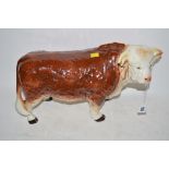 A large Melba Ware bull advertising shop's 'Butcher's Bull', 40cms long.