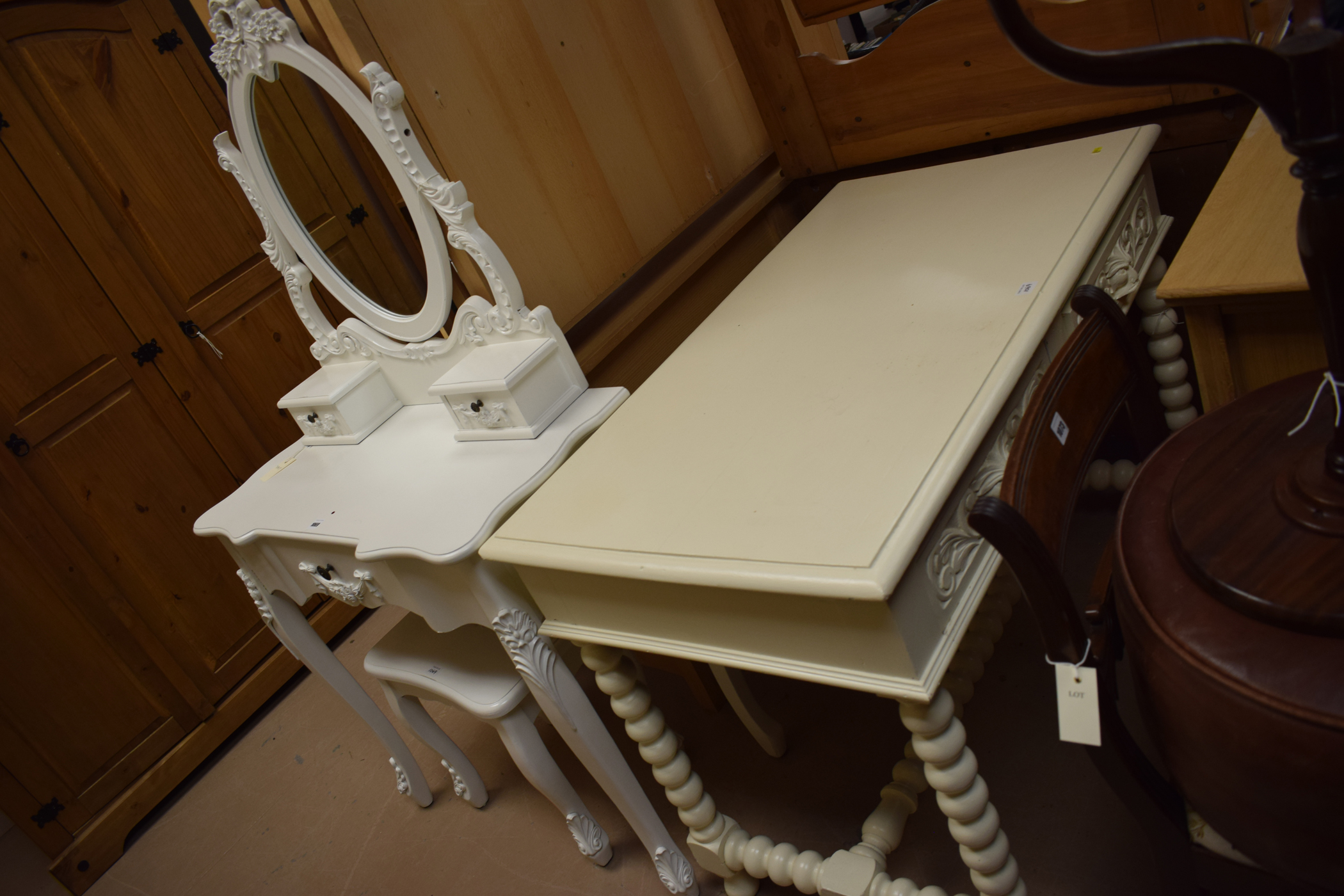 A cream painted rectangular table,