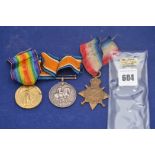 A group of three First World War medals awarded to 1112 Private J Longstaff,
