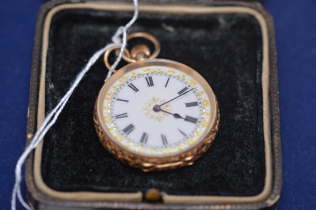 A yellow metal cased open faced fob watch stamped 14c,