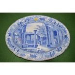 A Spode 'Pearlware' oval 19th Century meat dish depicting classical ruins.