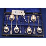 A set of six George V silver teaspoons and a pair of sugar tongs by Wilmot Manufacturing Co,