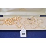 A cultured pearl necklace with yellow metal clasp stamped 375;