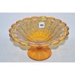 Enameled amber glass footed bowl.