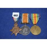 A group of three First World War medals awarded to CH:19056 Private W Ross,