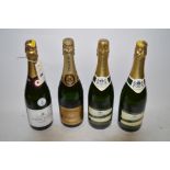 Four bottles of champagne to include Pierre Darcy's Brut; 2 bottles of Carpentier Verv Hennerick.