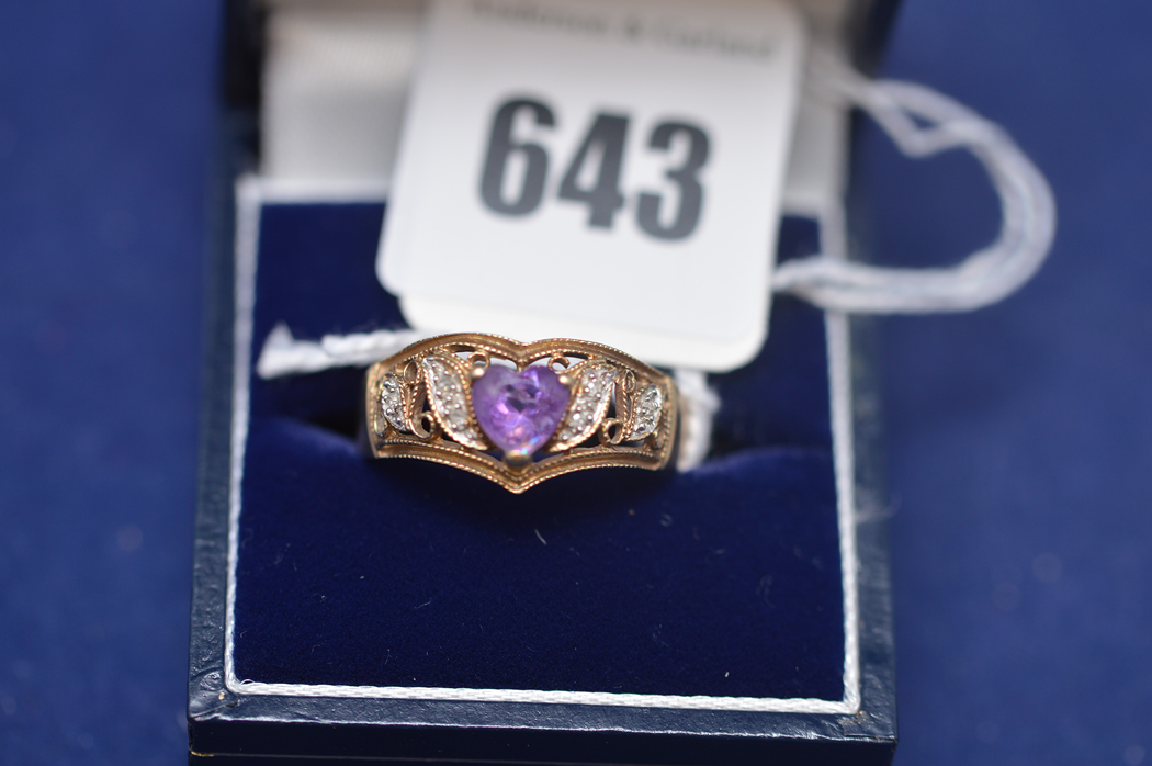 An amethyst and diamond dress ring on 9ct. yellow gold shank, ring size S, 3.2grms gross.