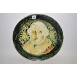 A Gateshead Art Pottery charger,