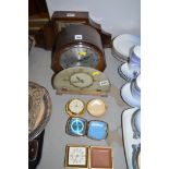 Clocks, to include: Smiths Enfield mantel clock; and three travel alarm clocks.