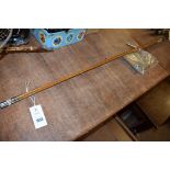 An Edgar Sealey Mayfly three-piece split cane 10ft. 6in. fly fishing rod, with canvas slip.