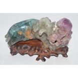 Note: amended description. Chinese Carved agate group of mythical animals on a carved wooden stand.