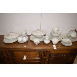A Royal Doulton part dinner service in 'Pillar Rose' pattern, to include: tureens,