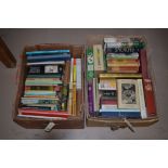 Two boxes of miscellaneous books.