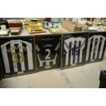 Four framed and signed Newcastle United...