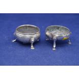 A pair of George III silver cauldron table salts