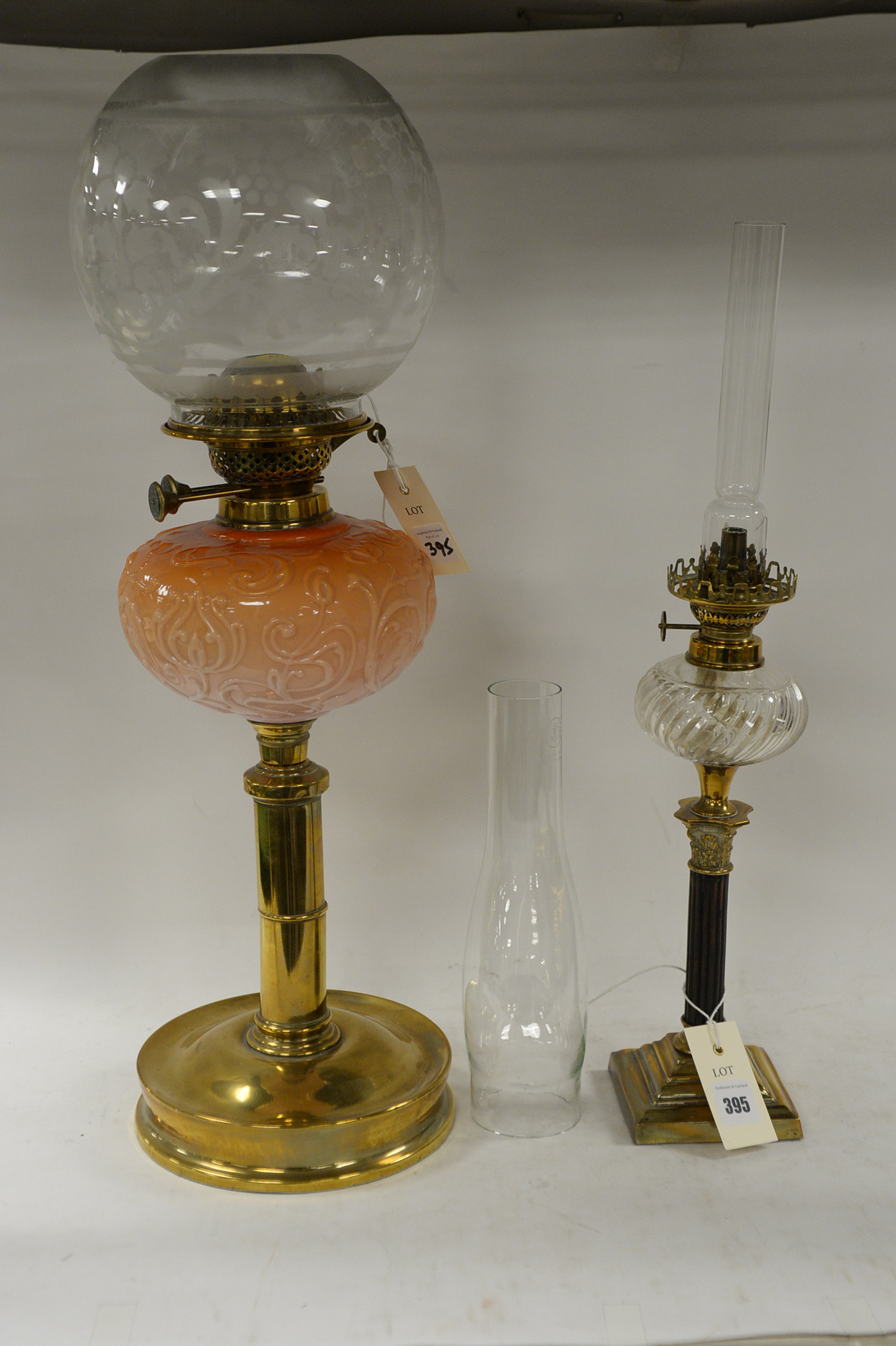Two glass oil lamps