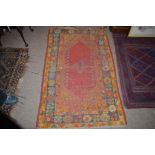 An early 20th century Ushak rug.