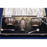 An Elizabeth II silver condiment set