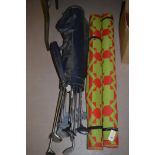 Set of golf clubs and pair of plastic outdoor mats