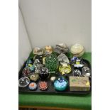 22 Paperweights to include Caithness - some signed; together with an onyx trinket box