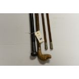 Walking stick with Dogs head handle; metal topped ebonised cane and 2 swagger sticks