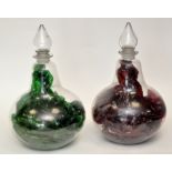 Pair of clear glass bottle shape chemist's jars and stoppers, stoppers of teardrop shape,