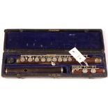 An Isidor B&S Lot model L rosewood flute...