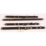 An ebony flute by Henry Potter London dated...