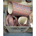 Three pairs of lined patterned terracotta curtains,