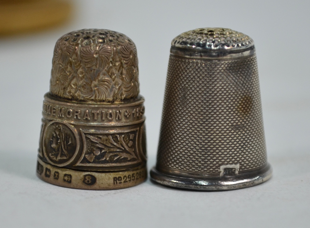 A leather-cased necessaire, containing a pair of silver mounted scissors and a needle-case, - Image 8 of 8