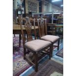 A pair of 19th century mahogany ear back dining side chairs,