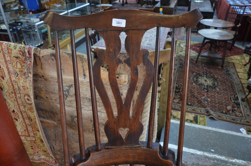 A 19th century elm seat comb back chair with flat arms, - Image 5 of 6