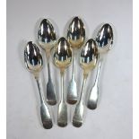 A matched set of six Victorian silver fiddle pattern dessert spoons, various makers,