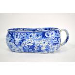The Coysh Collection - A 19th century pearlware blue transfer printed bourdaloue of waisted form