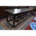 A 17th century jointed oak framed refectory table,