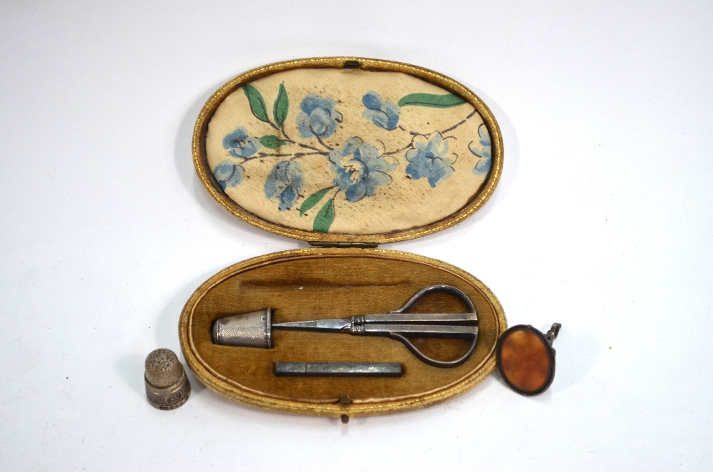 A leather-cased necessaire, containing a pair of silver mounted scissors and a needle-case, - Image 2 of 8