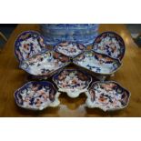 An early 19th century Staffordshire part dessert service decorated in the Imari style,