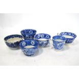 The Coysh Collection - Four 19th century blue transfer printed tea bowls including one by Thomas