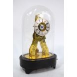 A late Victorian small brass skeleton clock with alarm movement striking on a bell,