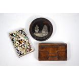 A 19th century carved wood snuff box in the form of a pocket-book,